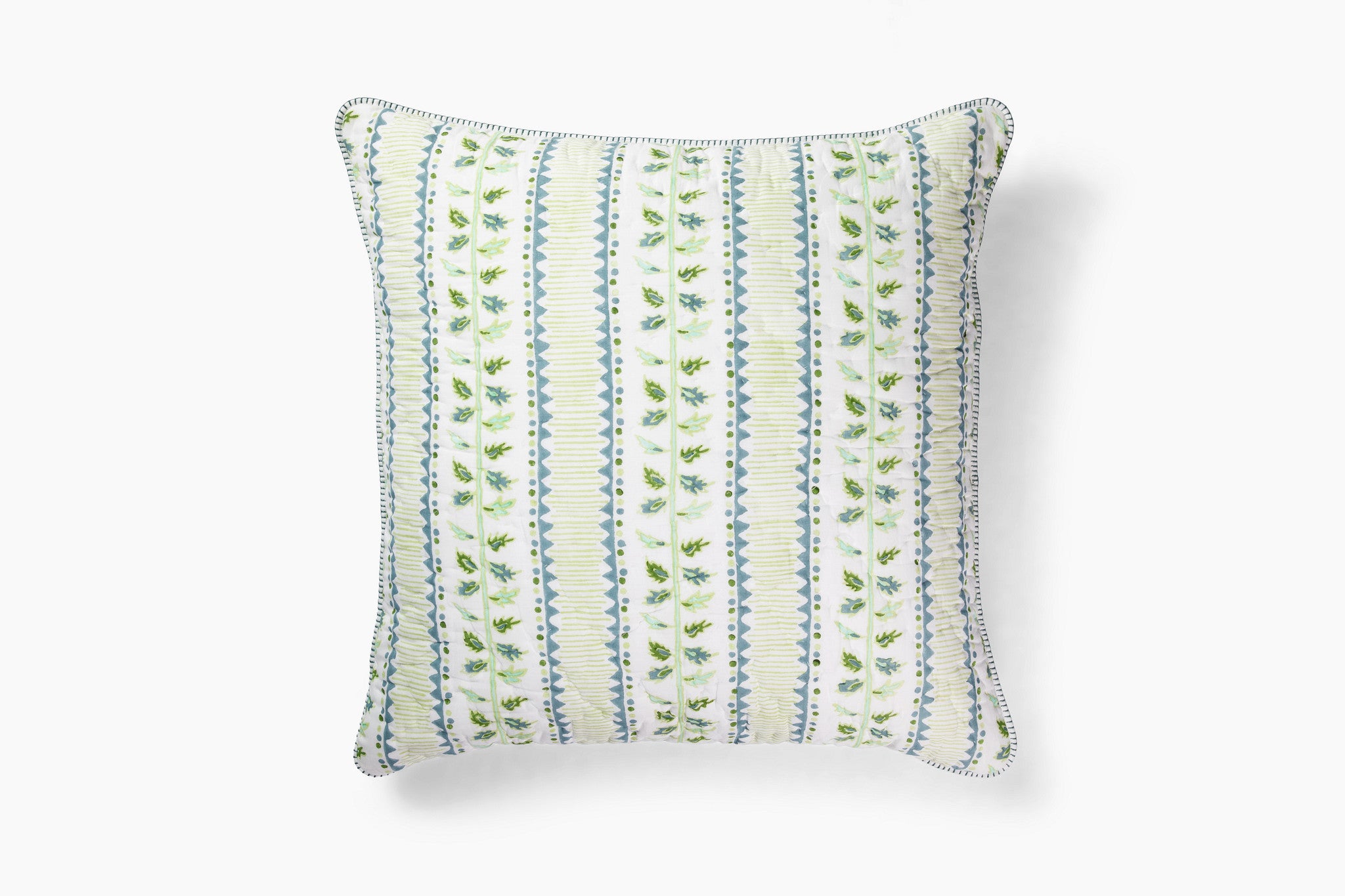 Decorative pillow with green leaf pattern on a white background