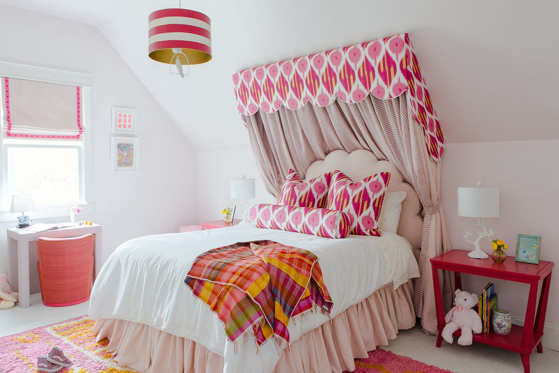 Bright fun toddler bedroom with white bedding. Photos by Christina Hussey and design by Alexis Warren.  