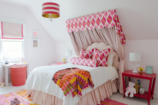 Bright fun toddler bedroom with white bedding. Photos by Christina Hussey and design by Alexis Warren.  